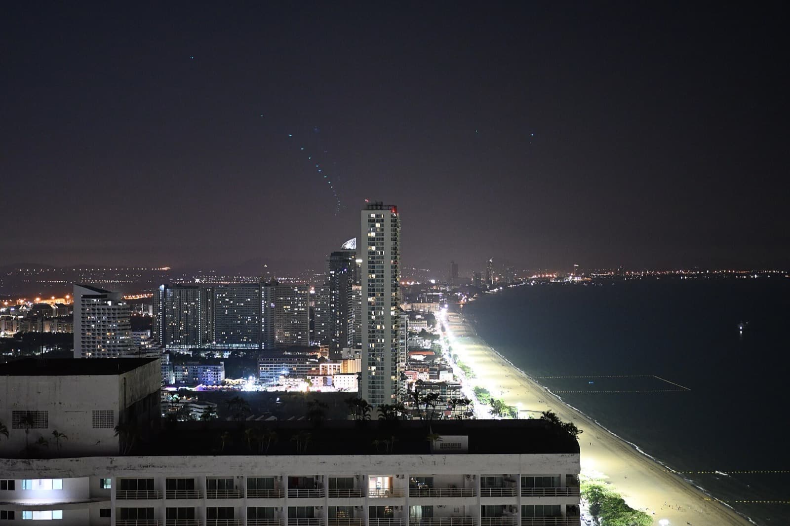 Pattaya beach and city lights at night
