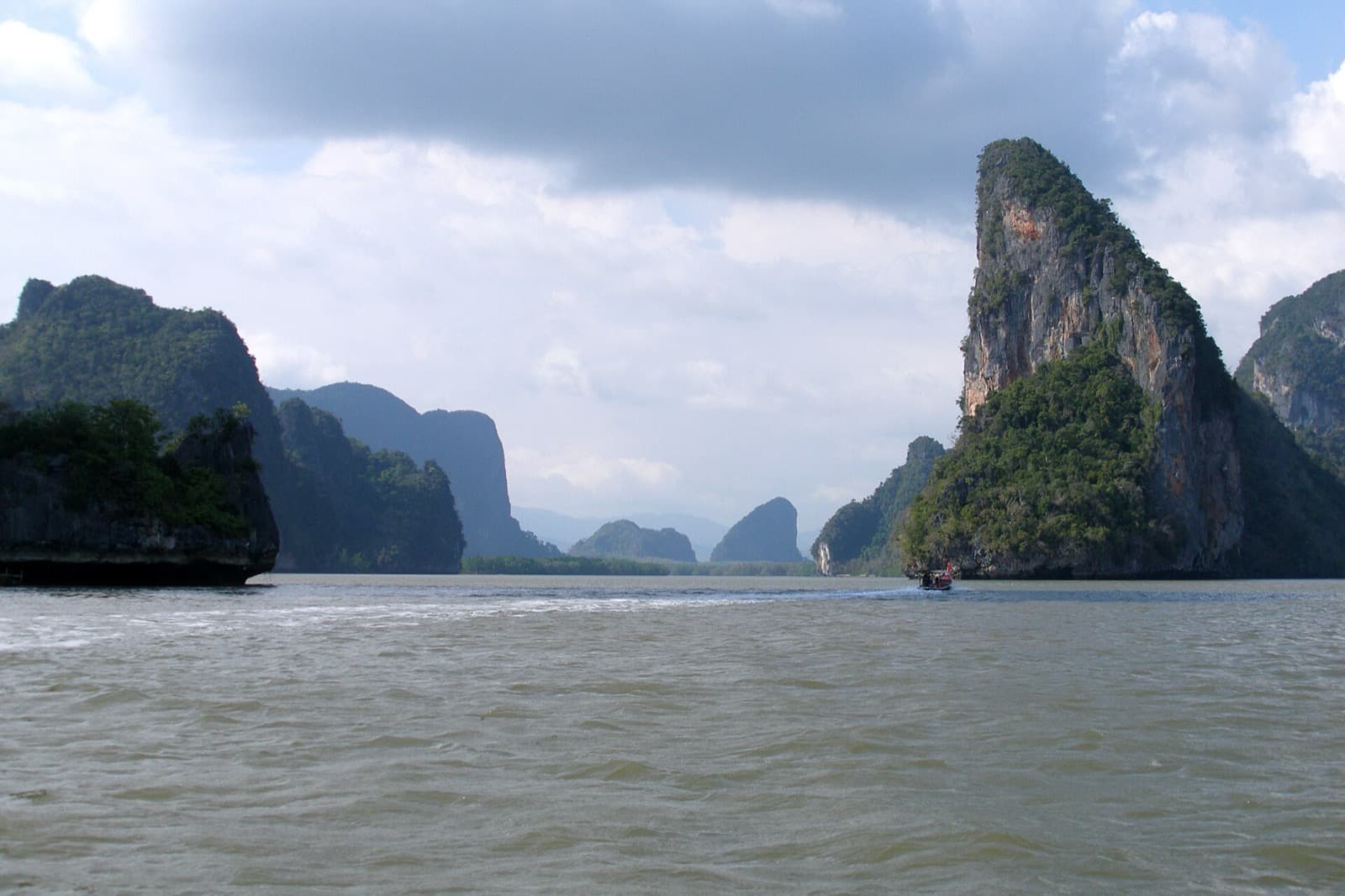 Limestone karst formations rising from Phang Nga Bay